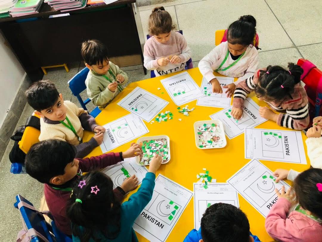 Students performing on stage during a school event
