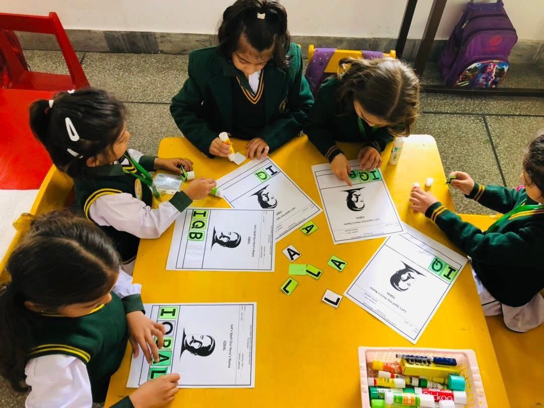 Students performing on stage during a school event