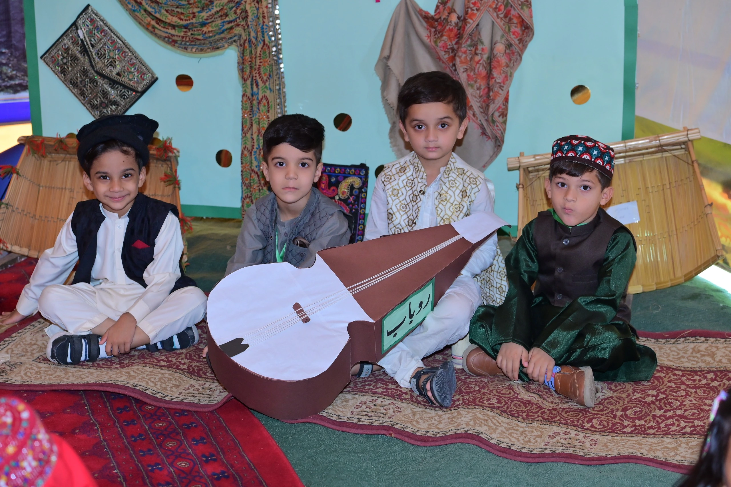 Students planting saplings in the school garden